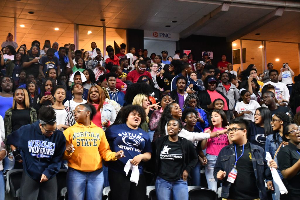 Students cheering at college signing day 2018 event