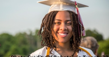Black girl smiling on graduation day