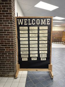 A welcome signboard with different languages