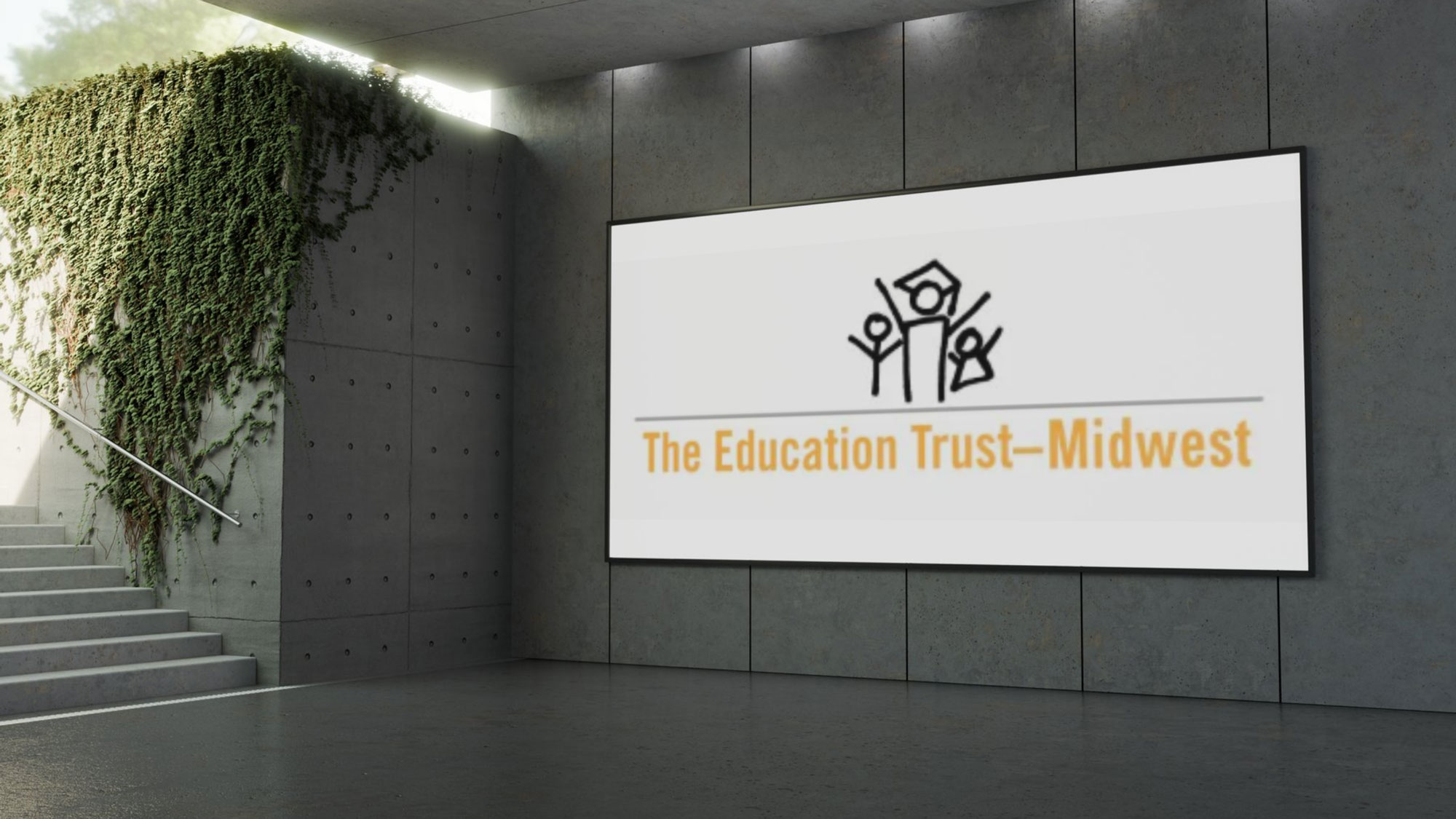 The Education Trust-Midwest logo on an advertising wall in a stairwell