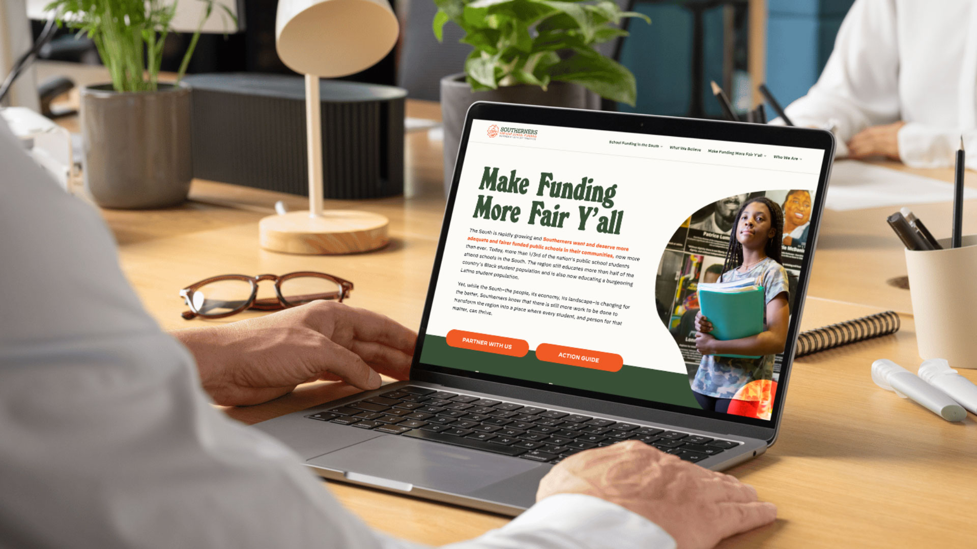 Screenshot of the Southerners for Fair School Funding website on a laptop screen with the tagline Make Funding Fair Y'all